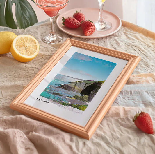 Baggy Point art print by Vicki Shortt, the headland above Croyde on the north Devon coast, framed in a room setting
