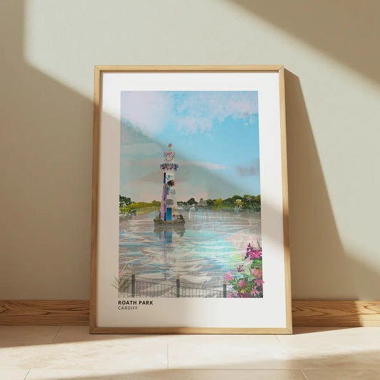 Roath Park art print by Vicki Shortt, the lake and Scott memorial lighthouse at Roath Park, Cardiff, framed in a room setting