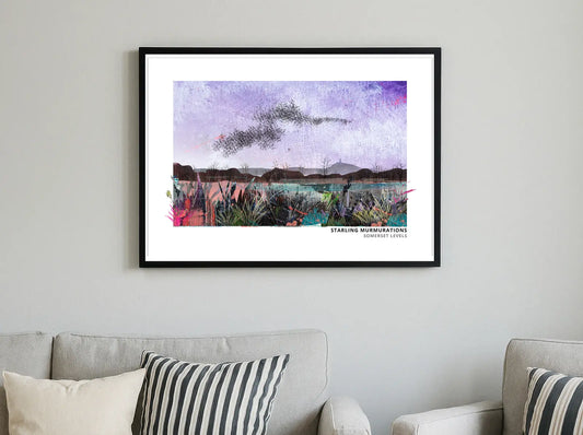 Starling Murmurations art print by Vicki Shortt, a murmuration of starlings wheeling across the sky, framed in a room setting