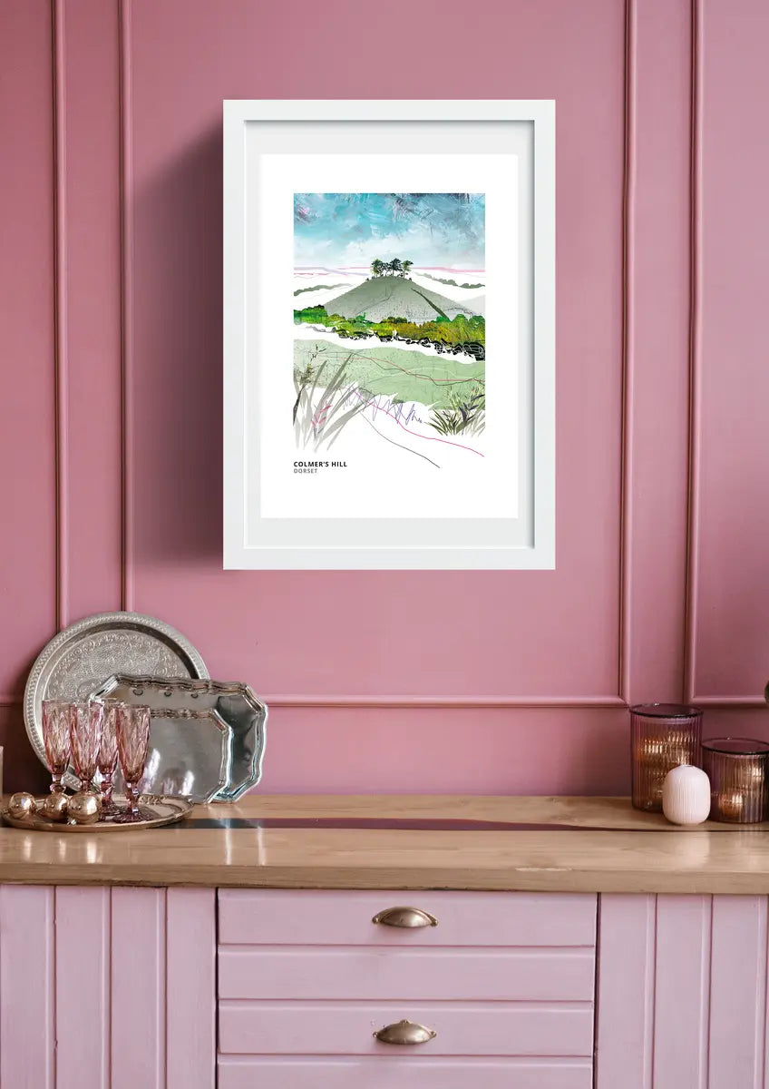 Colmer's Hill art print by Vicki Shortt, the pine-topped conical hill above Symondsbury, Dorset, framed in a room setting