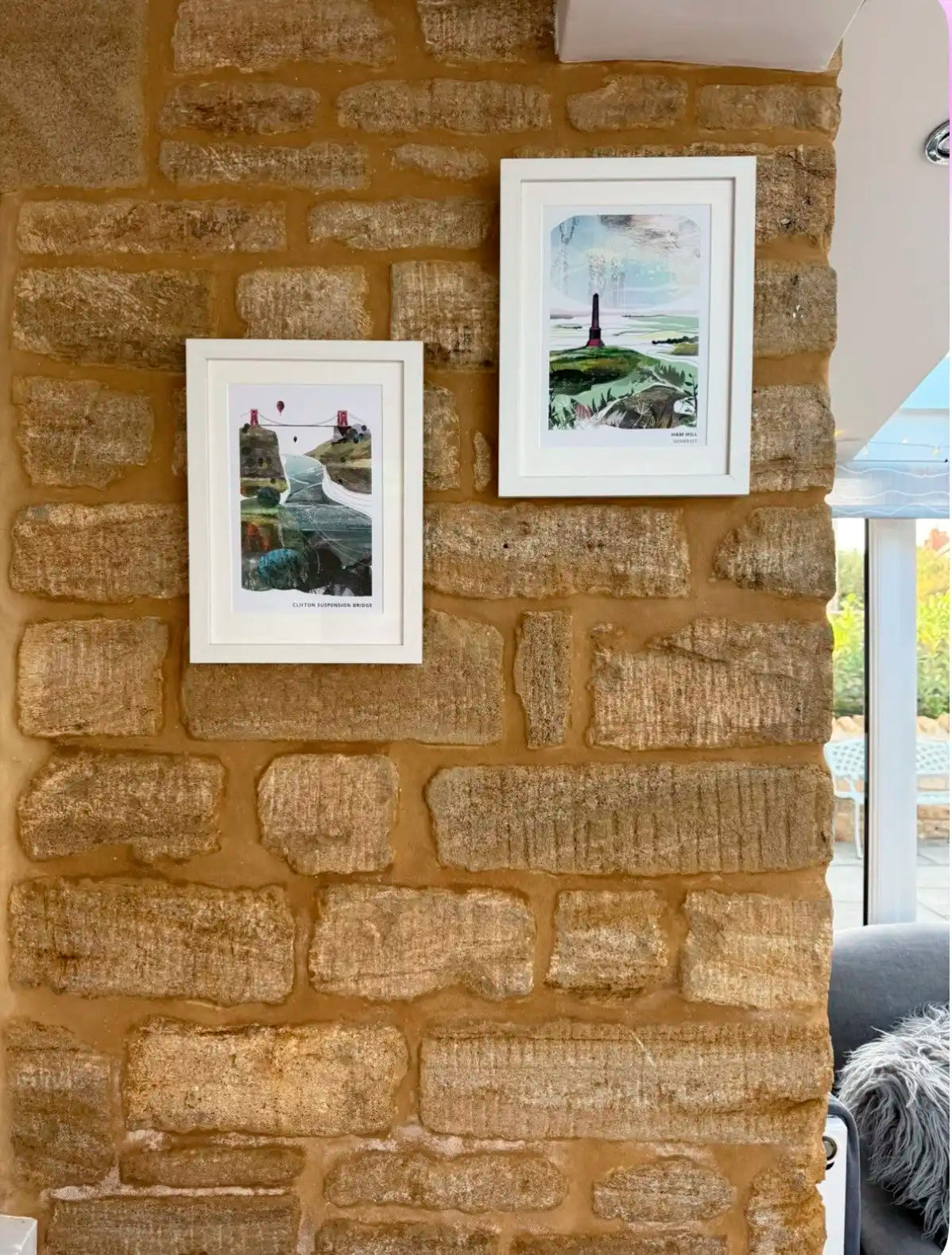 Vicki Shortt landscape art prints displayed on the walls of a corporate workspace