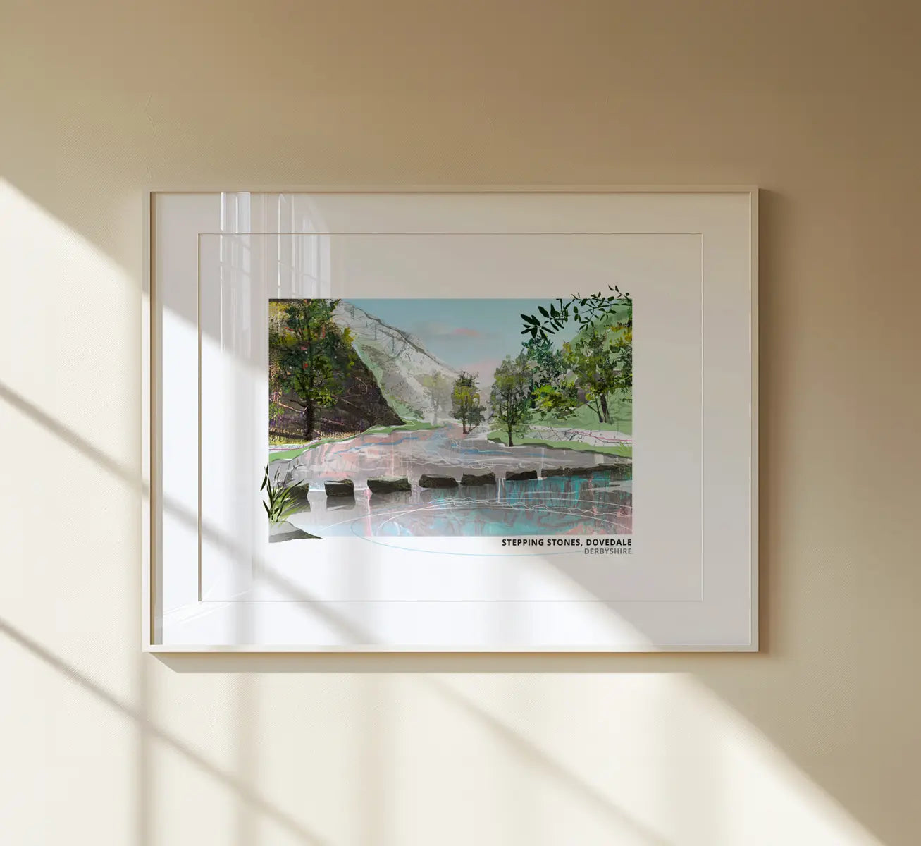 Dovedale Stepping Stones art print by Vicki Shortt, the stepping stones across the River Dove, Derbyshire, spring and summer design, framed in a room setting