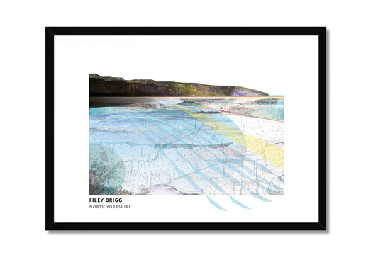 Filey Brigg art print by Vicki Shortt, the rocky spit reaching into the sea at Filey, North Yorkshire, in a black frame