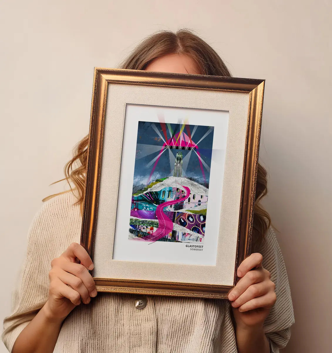 GlastoFest art print by Vicki Shortt, the pyramid stage lights below Glastonbury Tor, Somerset, framed in a room setting