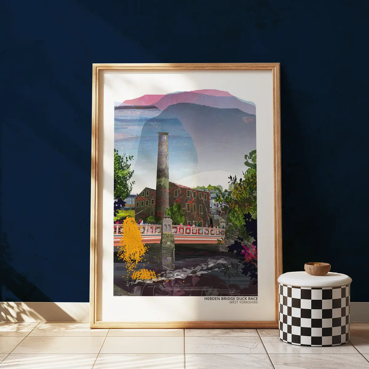 Hebden Bridge Duck Race art print by Vicki Shortt, the annual duck race through Hebden Bridge, West Yorkshire, framed in a room setting