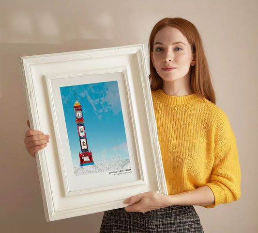 Jubilee Clock Tower Weymouth art print by Vicki Shortt, the painted clock tower on the seafront, framed in a room setting