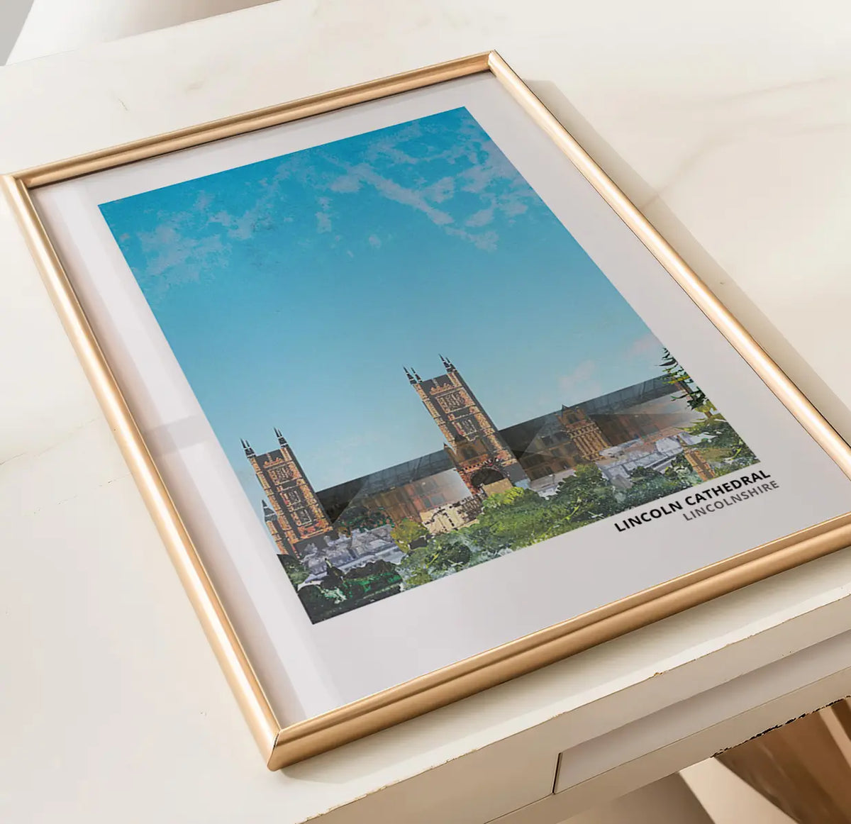 Lincoln Cathedral art print by Vicki Shortt, the three towers of the cathedral above the city of Lincoln, framed in a room setting