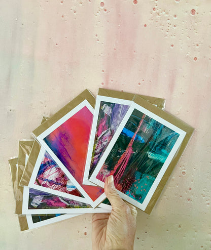 Mixed art cards by Vicki Shortt, an assortment of Vicki's landscape designs as greetings cards, fanned out with their envelopes