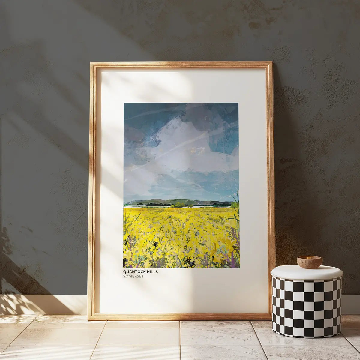 Quantock Hills art print by Vicki Shortt, a rapeseed field below the Quantock Hills in Somerset, framed in a room setting