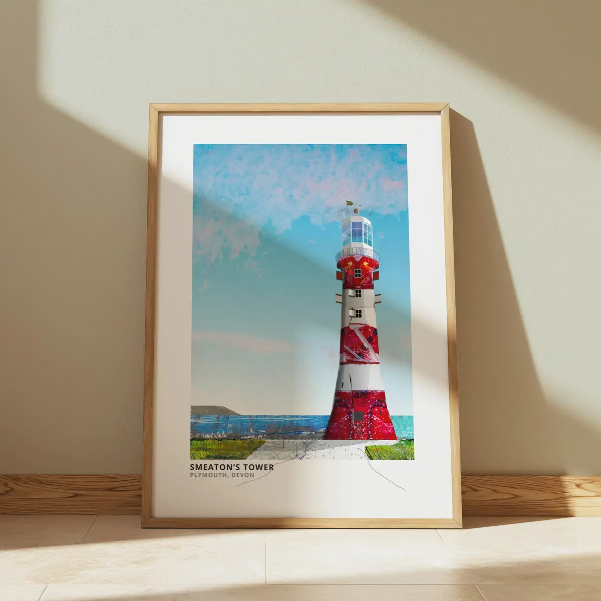 Smeaton's Tower art print by Vicki Shortt, the red and white lighthouse on Plymouth Hoe, Devon, framed in a room setting