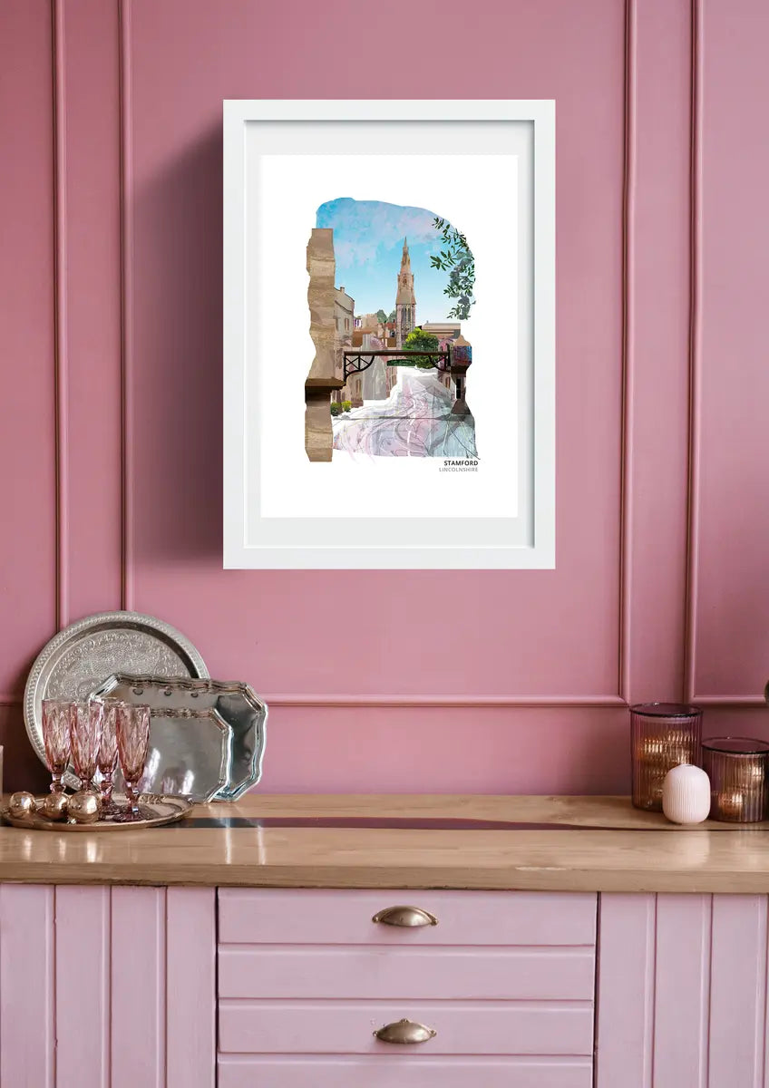 Stamford art print by Vicki Shortt, the main road into Stamford framed by the gallows sign of The George Hotel, Lincolnshire, framed in a room setting