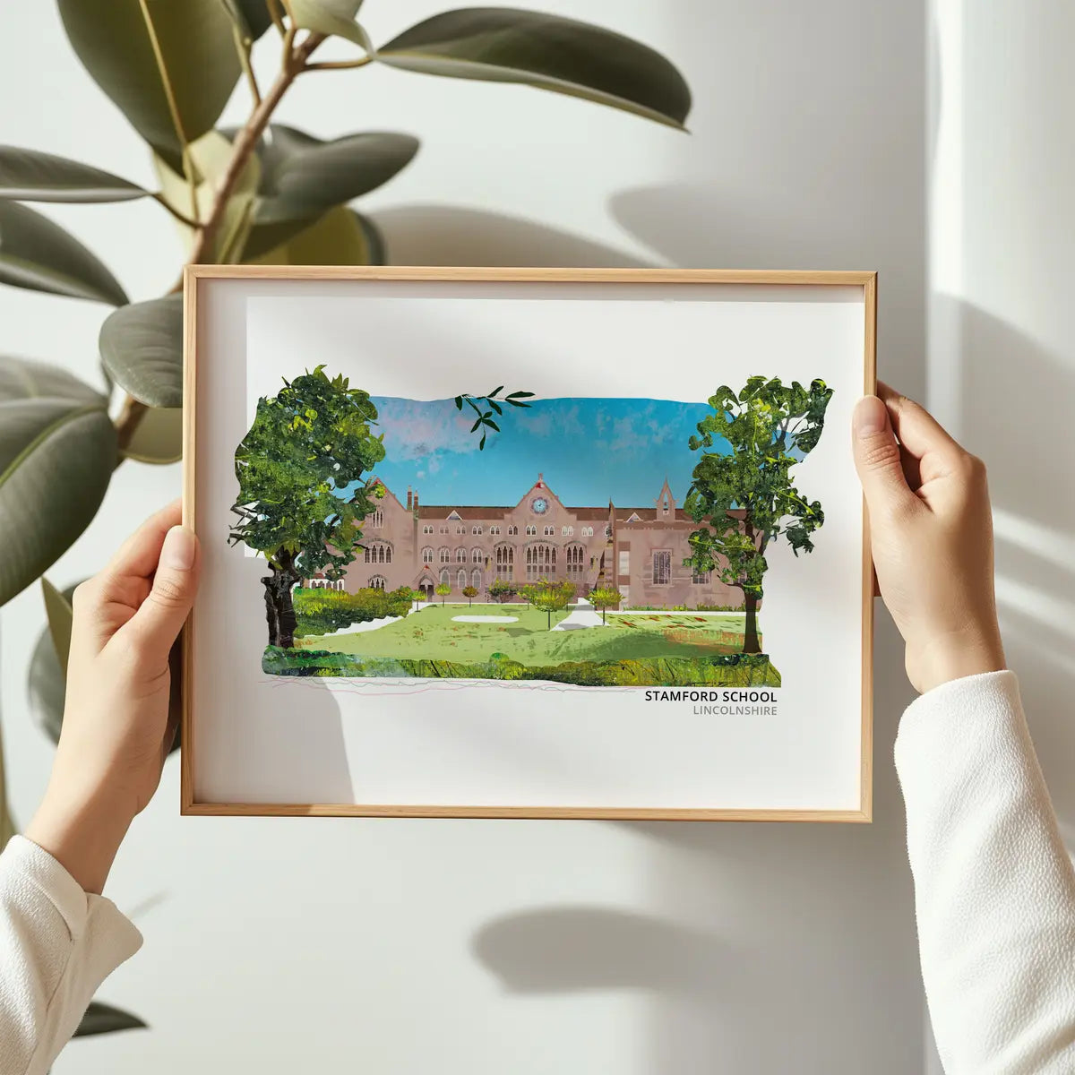 Stamford School art print by Vicki Shortt, the historic golden limestone buildings of the school in Stamford, Lincolnshire, framed in a room setting