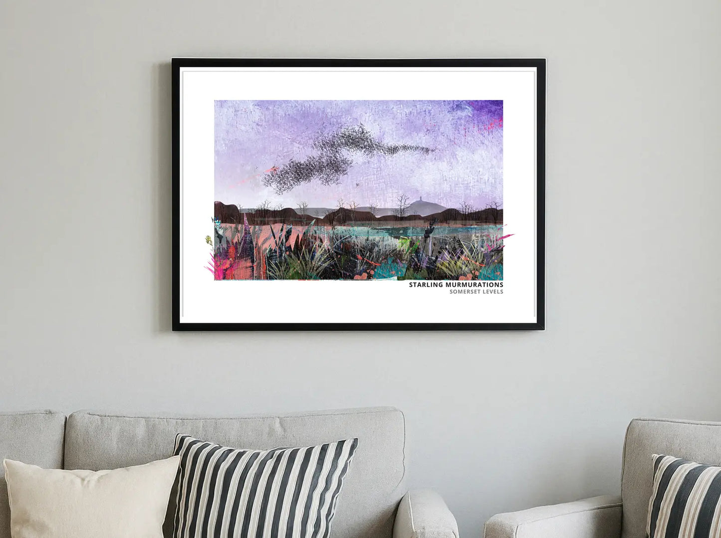 Starling Murmurations art print by Vicki Shortt, a murmuration of starlings wheeling across the sky, framed in a room setting