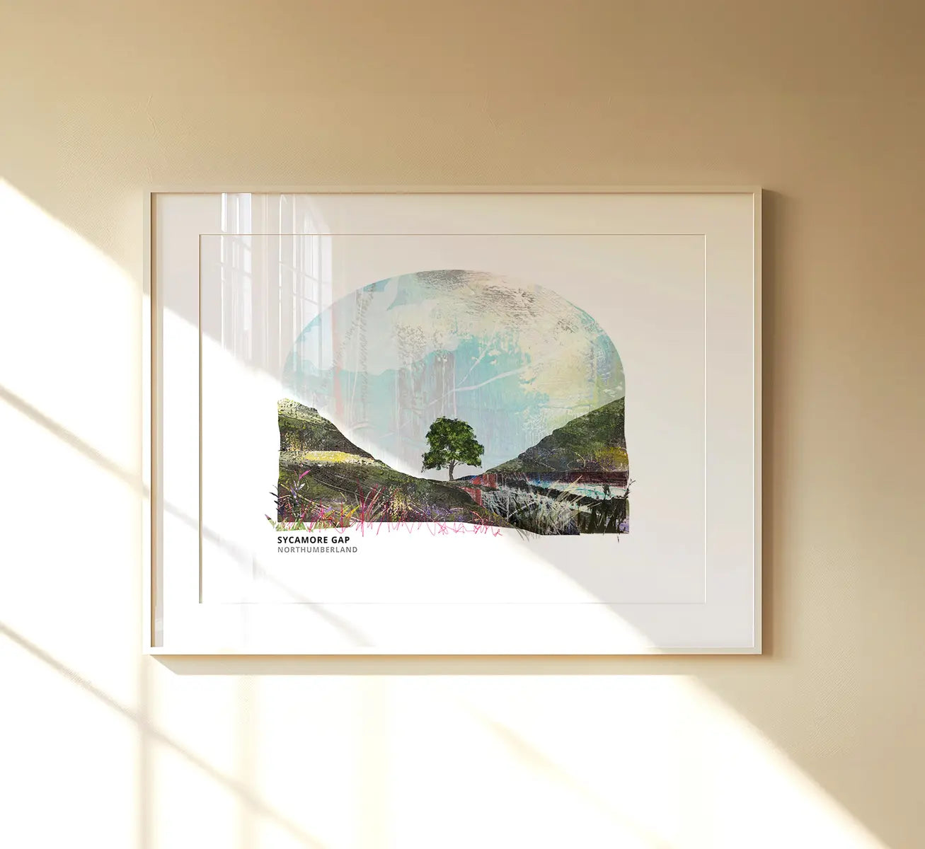 Sycamore Gap art print by Vicki Shortt, the tree in its dip on Hadrian's Wall, Northumberland, framed in a room setting