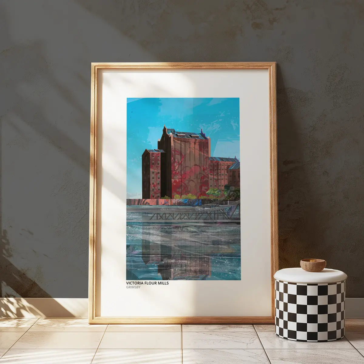 Victoria Flour Mills art print by Vicki Shortt, the tall brick mill building on the Grimsby waterfront, framed in a room setting