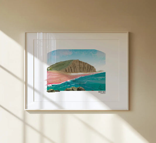 West Bay Dorset art print by Vicki Shortt, the harbour and sandstone cliffs on the Jurassic Coast, framed in a room setting